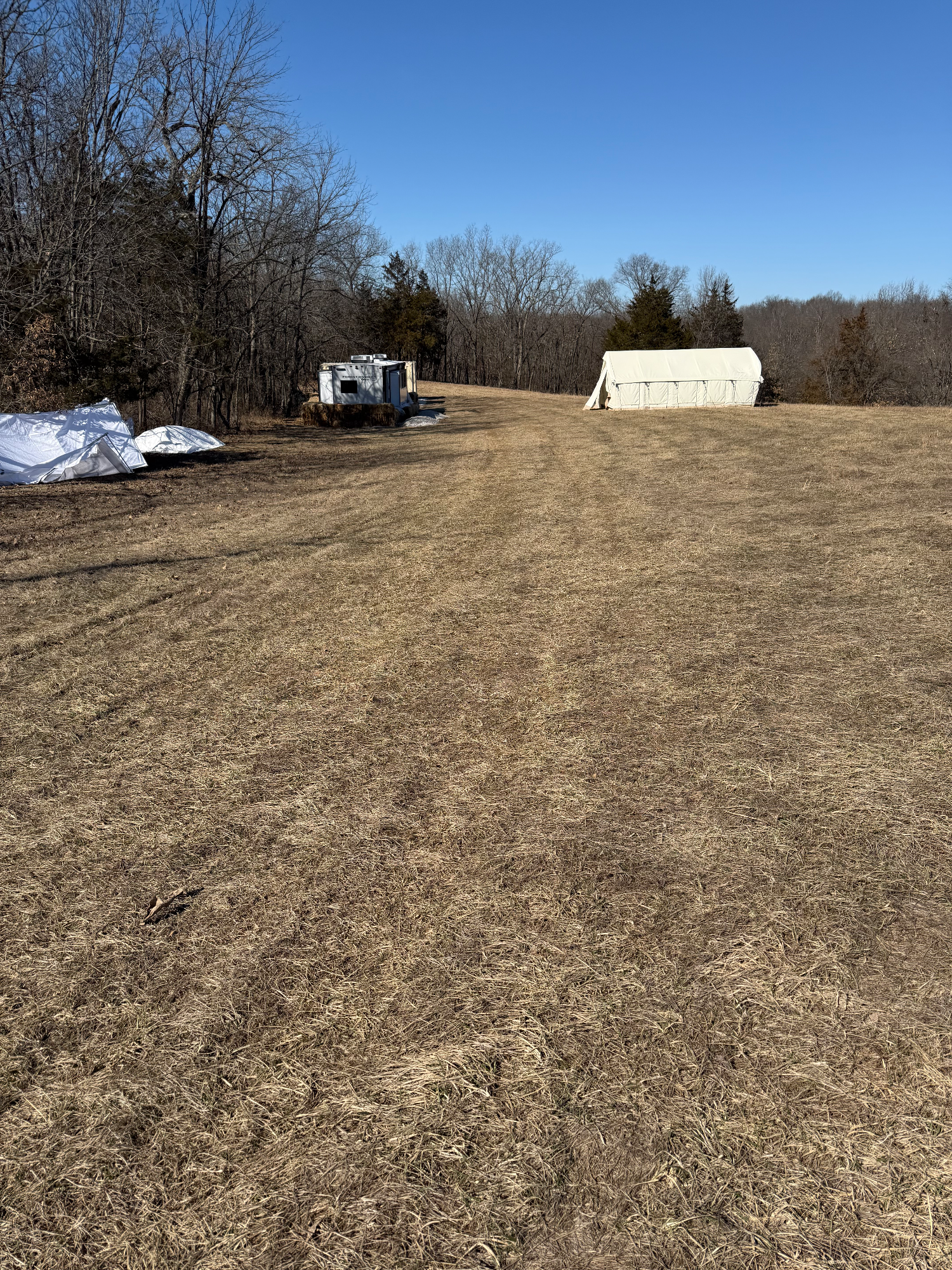 Raw dirt path through grass where a new driveway will be built in Silex, MO